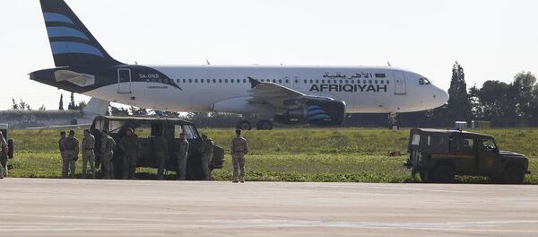 Самолет ливийской компании Afriqiyah Airways Airbus A320 в аэропорту Мальты - Sputnik Казахстан