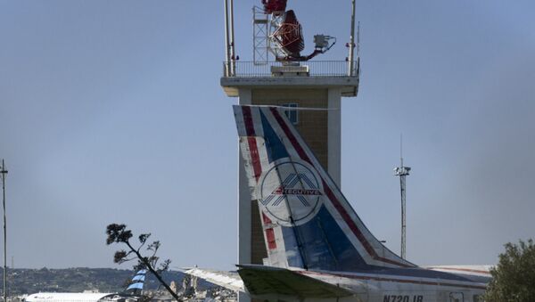 Cамолет из Ливии стоит на взлетной полосе международного аэропорта Мальты - Sputnik Казахстан