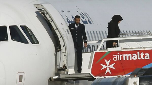 Освобождение заложников захваченного ливийского самолета - Sputnik Казахстан