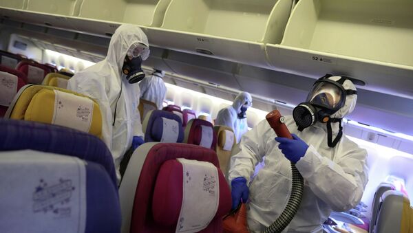Дезинфекция салона самолет по предотвращению распространения коронавируса  - Sputnik Казахстан
