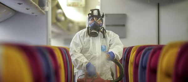 Дезинфекция салона самолет по предотвращению распространения коронавируса Дезинфекция салона самолет по предотвращению распространения коронавируса - Sputnik Казахстан
