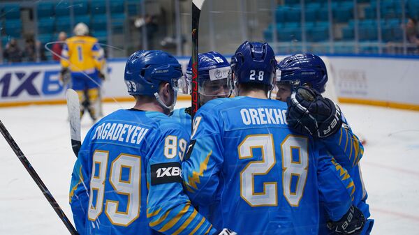 Сборная Казахстана по хоккею во время матча с командой Украины - Sputnik Казахстан