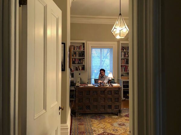 This handout photo released from the Twitter account of Canadian Prime Minister Justin Trudeau and taken on March 13, 2020 shows him in self-isolation working from home in Ottawa, Canada after his wife, Sophie Grйgoire Trudeau, tested positive for coronavirus (COVI-19). 
 - Sputnik Казахстан