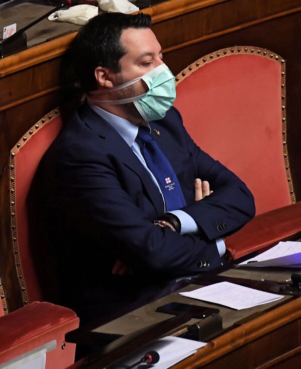 Leader of Italy's far-right League party Matteo Salvini wears a protective face mask, as Italian Prime Minister Giuseppe Conte addresses the Senate, the upper house of parliament, on the spread of coronavirus disease (COVID-19), in Rome, Italy, March 26, 2020  - Sputnik Казахстан