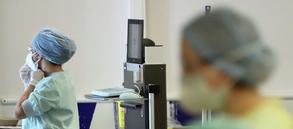 Медсестры в больнице с коронавирусом - Sputnik Казахстан