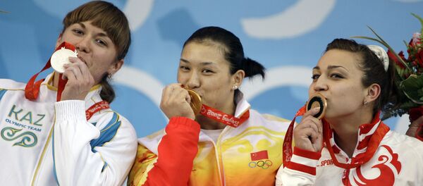 Алла Важенина, Цао Лэй, Надежда Евстюхина на Олимпиаде в Пекине Алла Важенина, Цао Лэй, Надежда Евстюхина на Олимпиаде в Пекине - Sputnik Казахстан