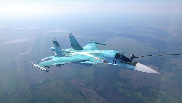 Захватывающие кадры дозаправки истребителей в воздухе - Sputnik Казахстан