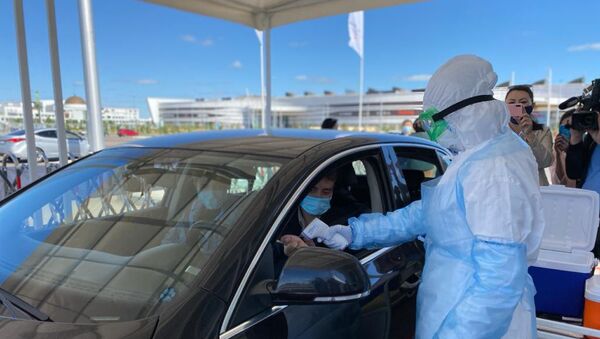 Жители столицы могут сдать тест на COVID-19, не выходя из авто - Sputnik Казахстан