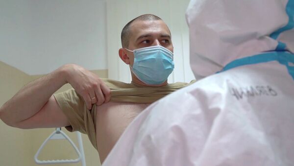Добровольцы об испытаниях вакцины от коронавируса - видео - Sputnik Казахстан