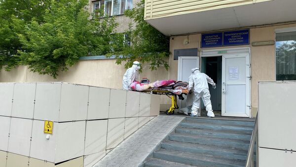 Пятиэтажный терапевтический корпус областной больницы отдали под провизорный стационар в Петропавловске - Sputnik Қазақстан