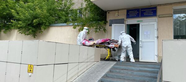 Пятиэтажный терапевтический корпус областной больницы отдали под провизорный стационар в Петропавловске Пятиэтажный терапевтический корпус областной больницы отдали под провизорный стационар в Петропавловске - Sputnik Казахстан