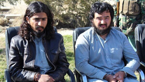 Задержанные в Афганистане боевики  Демир Зенлийов и Абдул Матин - Sputnik Казахстан