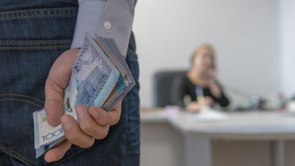 Деньги в руке, иллюстративное фото - Sputnik Казахстан