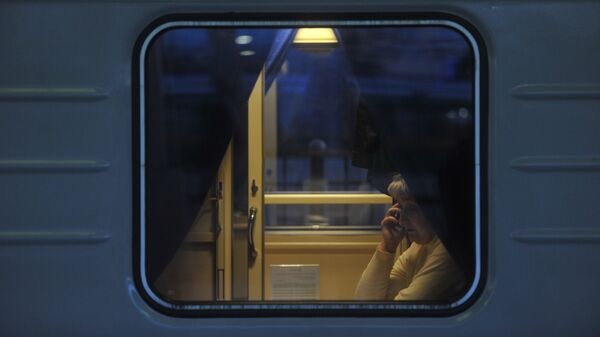 Архивное фото пассажира поезда - Sputnik Казахстан
