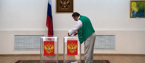 Голосование на выборах в Госдуму на избирательном участке в Астане - Sputnik Казахстан