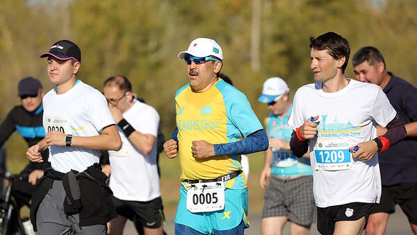 Архивное фото Карима Масимова во время благотворительного марафона в Астане - Sputnik Казахстан