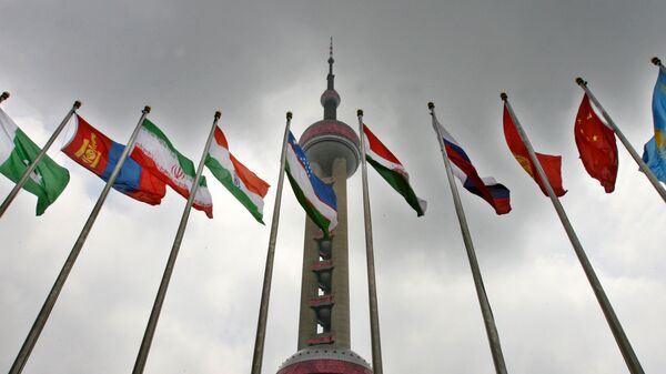 Флаги стран - членов ШОС, архивное фото - Sputnik Казахстан