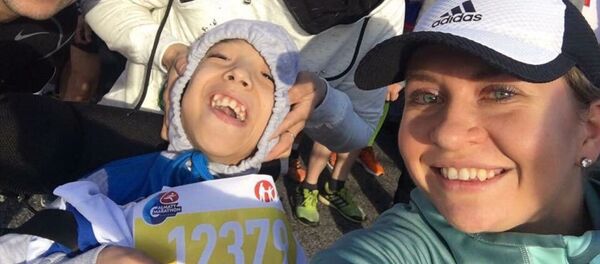 Аслан Шайкемелов на алматинском марафоне Аслан Шайкемелов на алматинском марафоне - Sputnik Казахстан