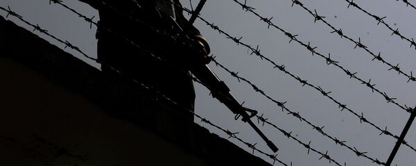 Тюремный охранник, архивное фото Тюремный охранник, архивное фото - Sputnik Казахстан