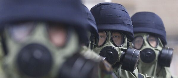 Архивное фото полицейских Южной Кореи в противогазах во время учений Архивное фото полицейских Южной Кореи в противогазах во время учений - Sputnik Казахстан