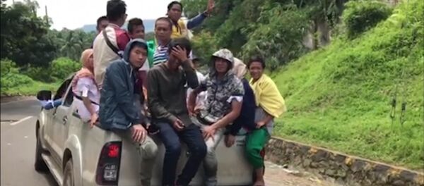 Филиппиндықтар Ислам мемлекеті содырларынан бас сауғалауда - Sputnik Қазақстан