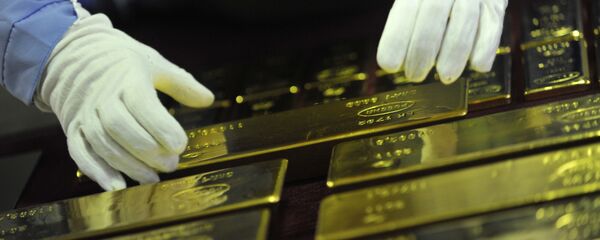 Золотые слитки Золотые слитки - Sputnik Казахстан