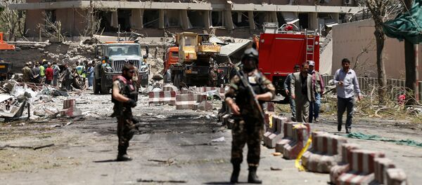 На месте теракта в Кабуле На месте теракта в Кабуле - Sputnik Казахстан