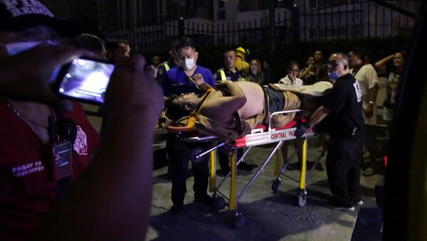 Раненый постоялец отеля Resorts World Manila в Маниле после инцидента в казино - Sputnik Казахстан