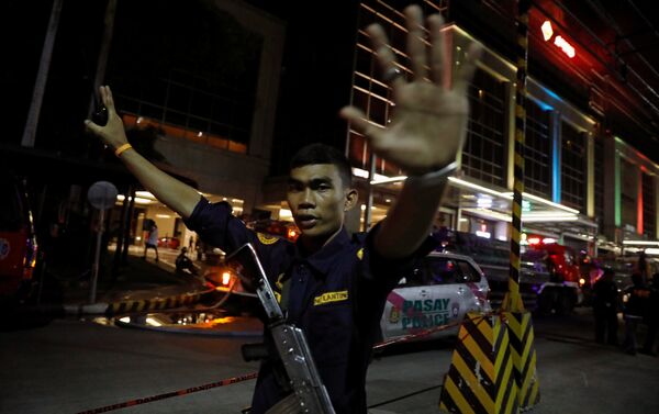 Ситуация у отеля Resorts World Manila в Маниле после инцидента в казино - Sputnik Казахстан