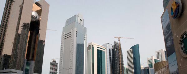 Одна из центральных улиц Дохи - столицы Катара, архивное фото Одна из центральных улиц Дохи - столицы Катара, архивное фото - Sputnik Казахстан