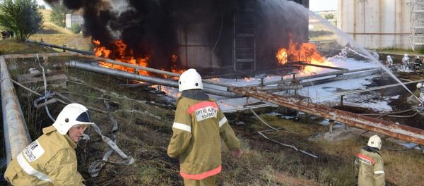 Нефтебаза АО Шымкент мұнайөнімдері в Шымкенте после возгорания резервуара с бензином Нефтебаза АО Шымкент мұнайөнімдері в Шымкенте после возгорания резервуара с бензином - Sputnik Казахстан