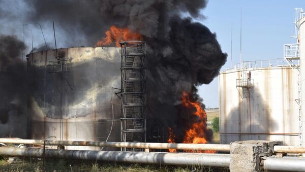 Нефтебаза АО Шымкент мұнайөнімдері в Шымкенте после возгорания резервуара с бензином - Sputnik Казахстан