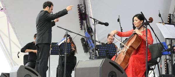 Катарский ансамбль вживую исполнил гимны двух стран на ЭКСПО Катарский ансамбль вживую исполнил гимны двух стран на ЭКСПО - Sputnik Казахстан