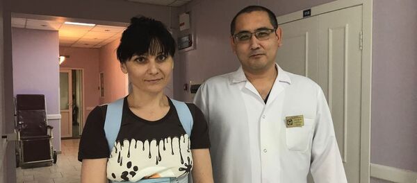 Завотделением травматологии № 1 Научно-исследовательского института травматологии и ортопедии РК Олжас Бекарисов и Оксана Якименко Завотделением травматологии № 1 Научно-исследовательского института травматологии и ортопедии РК Олжас Бекарисов и Оксана Якименко - Sputnik Казахстан