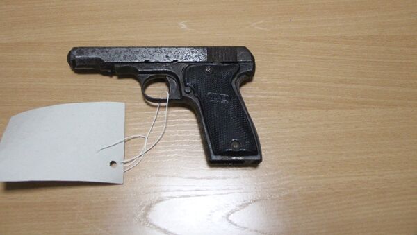 Пистолет 1933 года выпуска сдали в полицию в Павлодарской области - Sputnik Казахстан