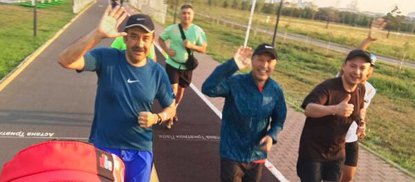 Карим Масимов и Адильбек Джаксыбеков на пробежке - Sputnik Казахстан