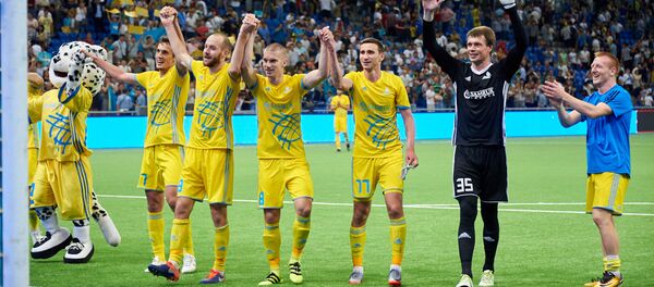 Игроки ФК Астана празднуют победу в матче с Легией Игроки ФК Астана празднуют победу в матче с Легией - Sputnik Казахстан