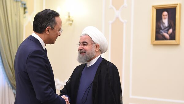 Глава МИД РК Кайрат Абрахманов и президент Ирана Хасан Рухани - Sputnik Казахстан