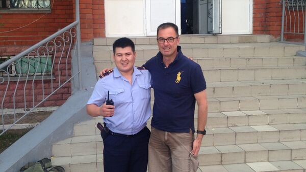Лейтенант полиции Азамат Балтабаев и старший сержант Жорж Киессер - Sputnik Казахстан