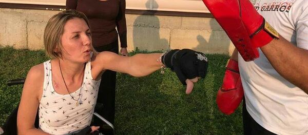 Алматинка Екатерина Парафиева, потерявшая ноги при ДТП Алматинка Екатерина Парафиева, потерявшая ноги при ДТП - Sputnik Казахстан