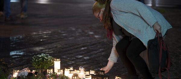 Свечи на нападения террориста в городе Турку - Sputnik Казахстан