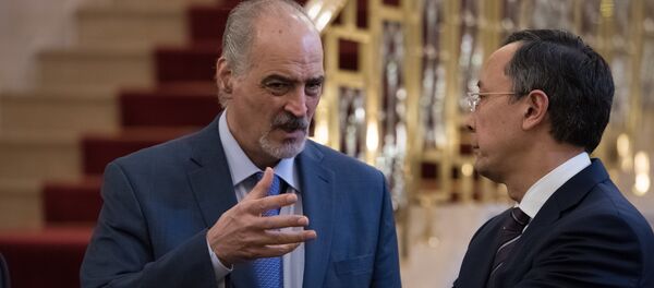 Башар Джафари (слева) и Кайрат Абдрахманов - Sputnik Казахстан