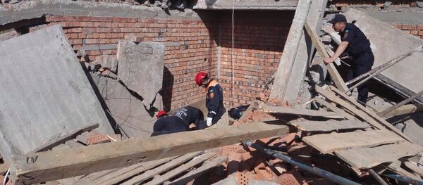 Перекрытие и стена обрушились в строящемся доме в Астане Перекрытие и стена обрушились в строящемся доме в Астане - Sputnik Казахстан