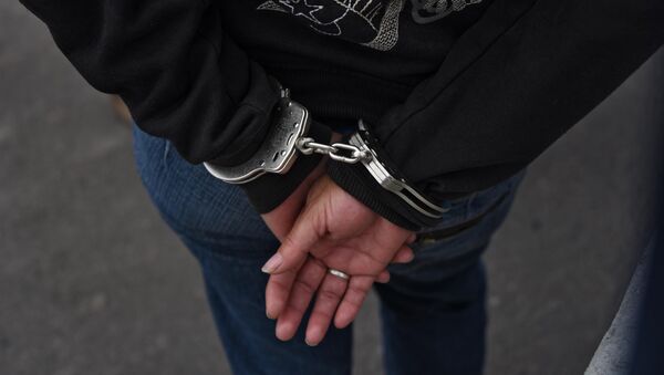 Женщина в наручниках, архивное фото - Sputnik Казахстан