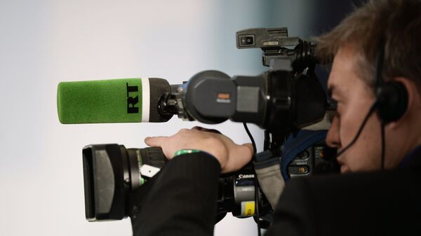 Оператор на съемке конференции RT, архивное фото - Sputnik Казахстан