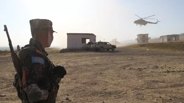 Военнослужащий во время миротворческих учений ОДКБ на полигоне в Киргизии, архивное фото - Sputnik Казахстан