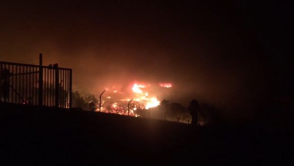 Мощные природные пожары бушуют в штате Калифорния (США) - Sputnik Казахстан