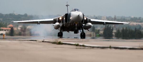 Российский самолет Су-24 на авиабазе Хмеймим в Сирии, архивное фото Российский самолет Су-24 на авиабазе Хмеймим в Сирии, архивное фото - Sputnik Казахстан
