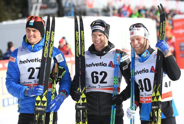 Призеры гонки на 15 км классическим стилем Тур де Ски (слева направо): Алексей Полторанин, Дарио Колонья, Мартин Йонсруд Сундбю - Sputnik Казахстан