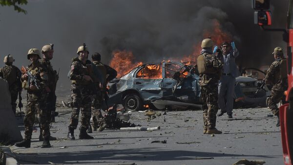 Персонал афганских сил безопасности на месте нападения террористов в Кабуле, архивное фото - Sputnik Казахстан